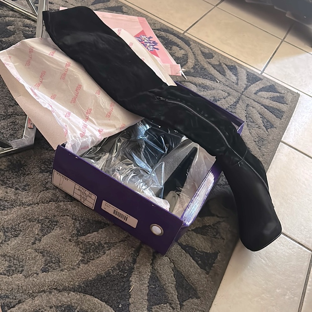 Brand new thigh high black suede boots, size 5.5